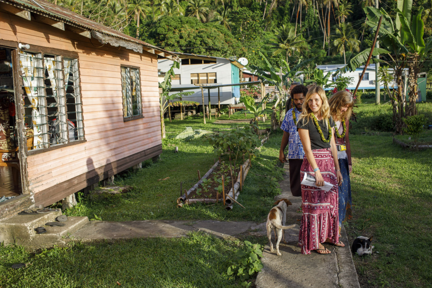 young woman visiting fijian village