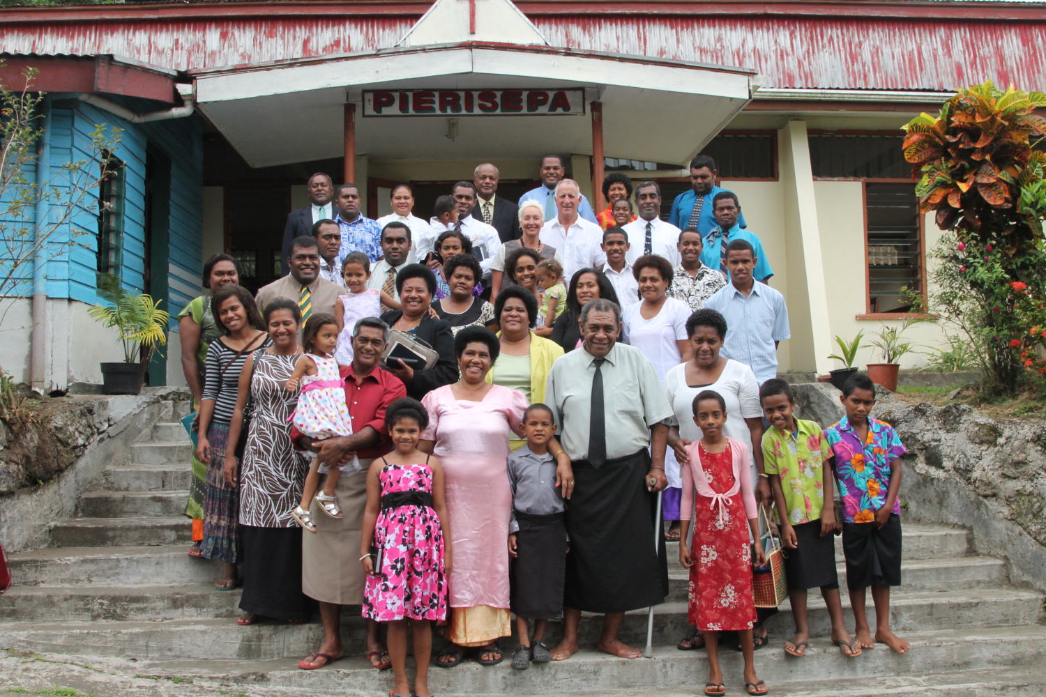 smiling fijian church congregation