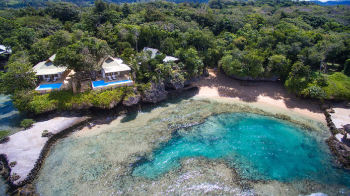 luxury private island villas overlooking ocean in fiji