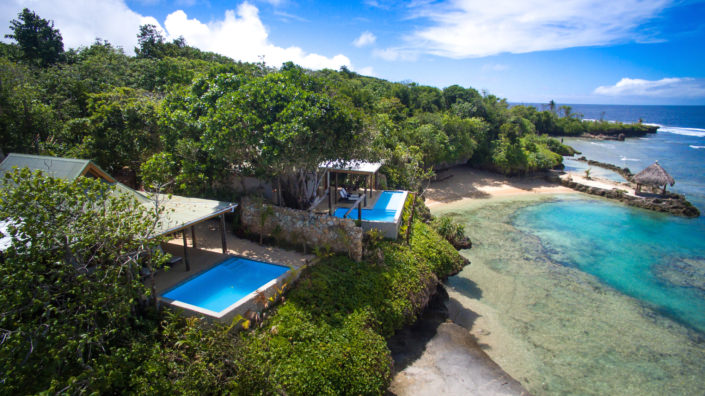 luxury private island villas overlooking ocean in fiji