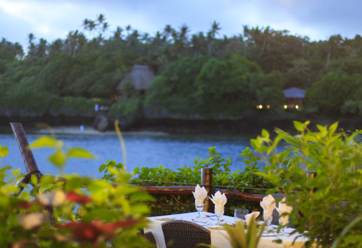 Romantic al fresco dining overlooking ocean in savusavu fiji