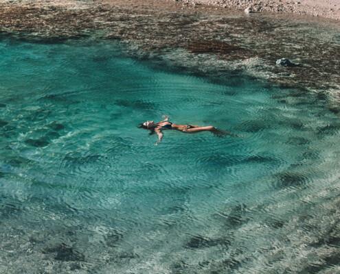 Woman swimming in a pool