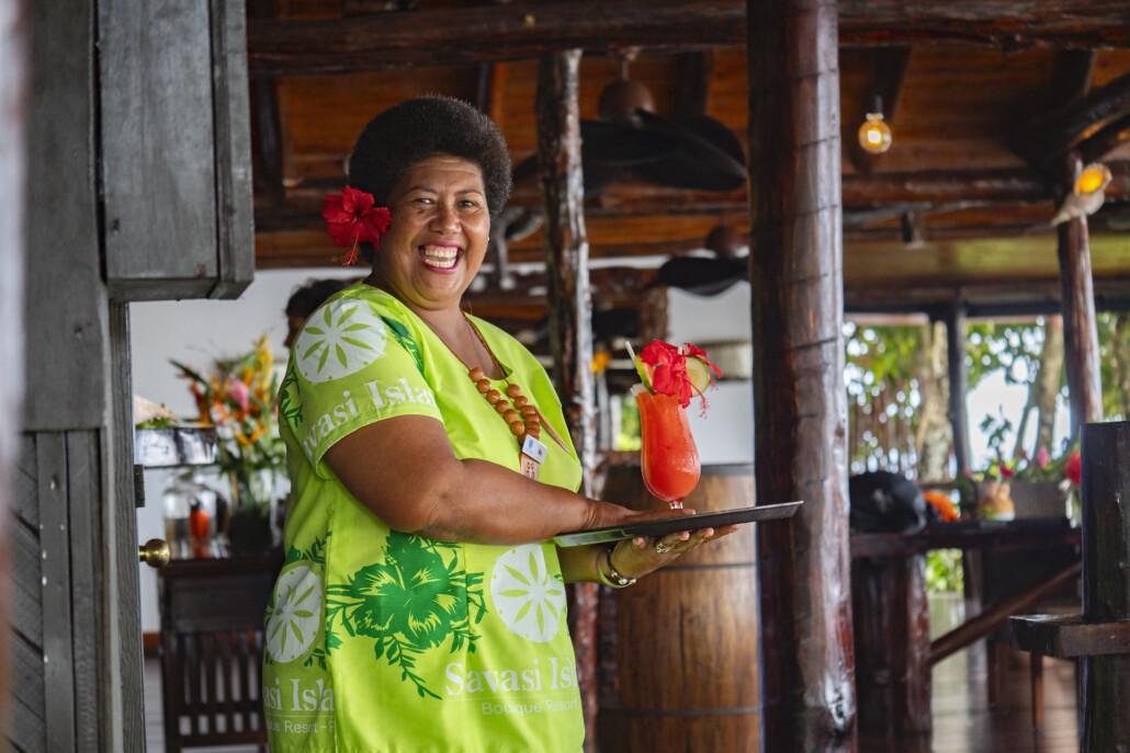 Fijian woman staff smiling at camera