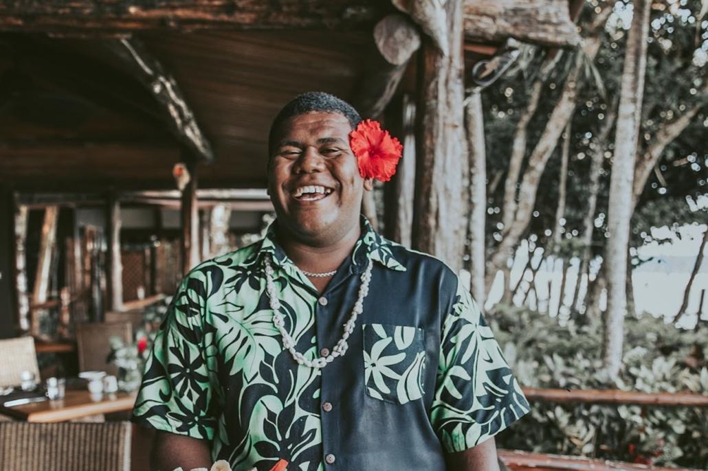 Fijian hotel staff member smiling at the camera