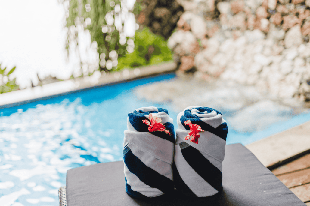 Two towels are on a lounging chair at Savasi Island Resort